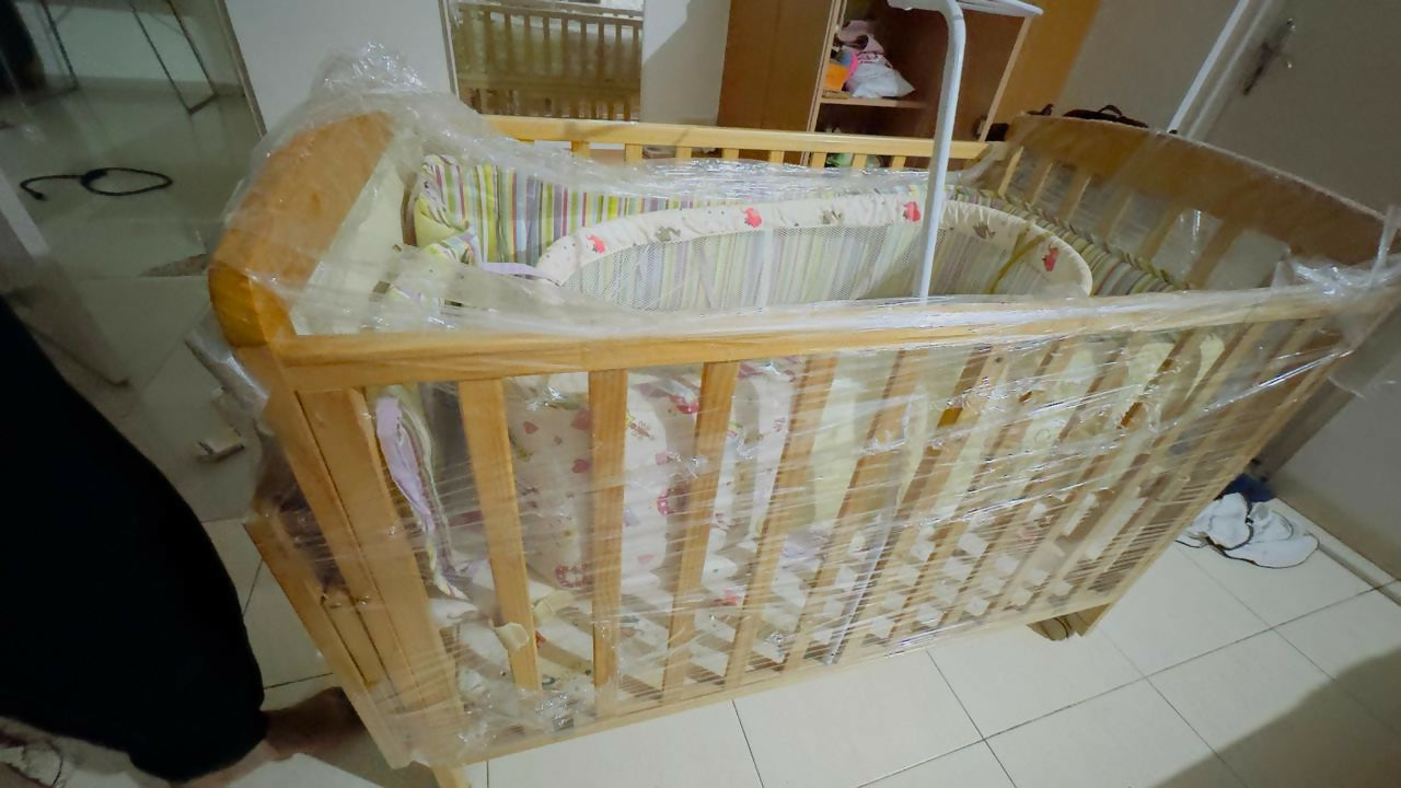 Secure and versatile, the BABYHUG Kelly Wooden Cot/Crib with a detachable bassinet and mosquito net offers comfort, protection, and style for your growing baby.