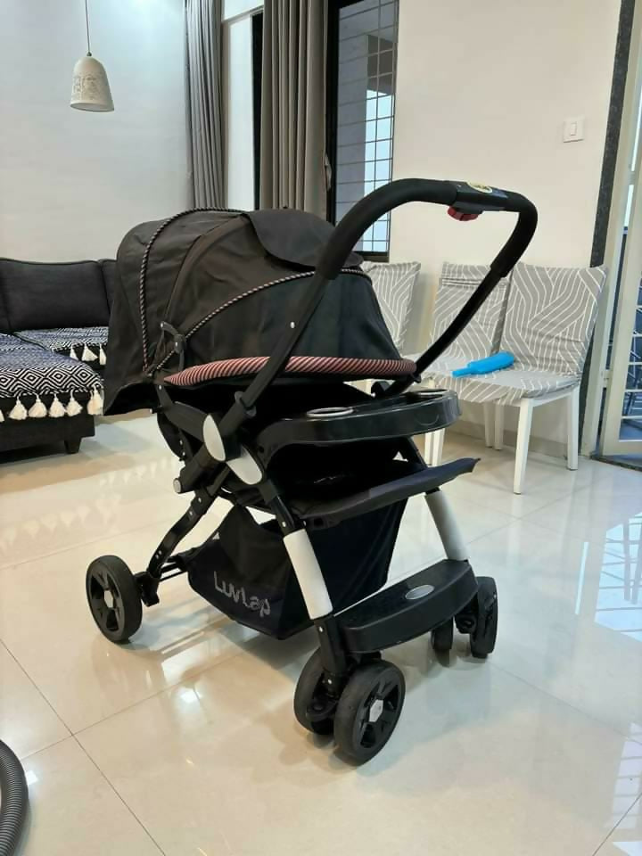 Experience comfort and convenience with the LUVLAP Galaxy Stroller/Pram, designed for safety and style in every outing with your baby.