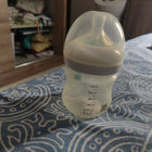 Philips Avent feeding bottle set with AirFree vent, two BPA-free bottles, anti-colic design, soft silicone nipples, and an ergonomic shape for comfortable feeding.