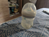Philips Avent feeding bottle set with AirFree vent, two BPA-free bottles, anti-colic design, soft silicone nipples, and an ergonomic shape for comfortable feeding.