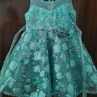Teal dress with floral details 