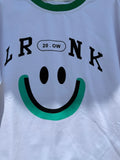 White t-shirt with black text and a green smiley face design 