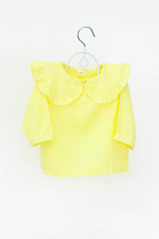 Shop the 100% cotton yellow frill top for girls, featuring breathable fabric and elegant frill details for a stylish and comfortable look.