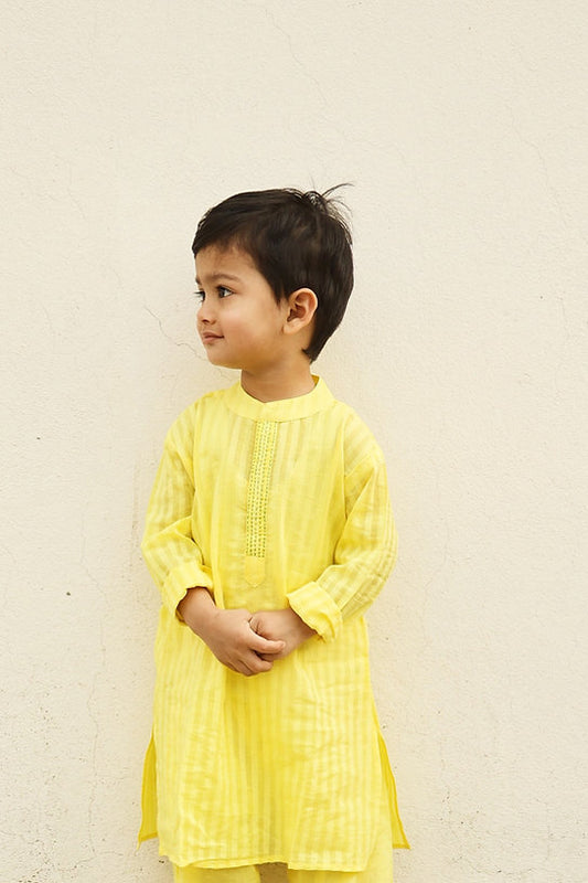 Shop now for stylish and comfortable striped yellow cotton kurta pajama sets for kids, perfect for any occasion!