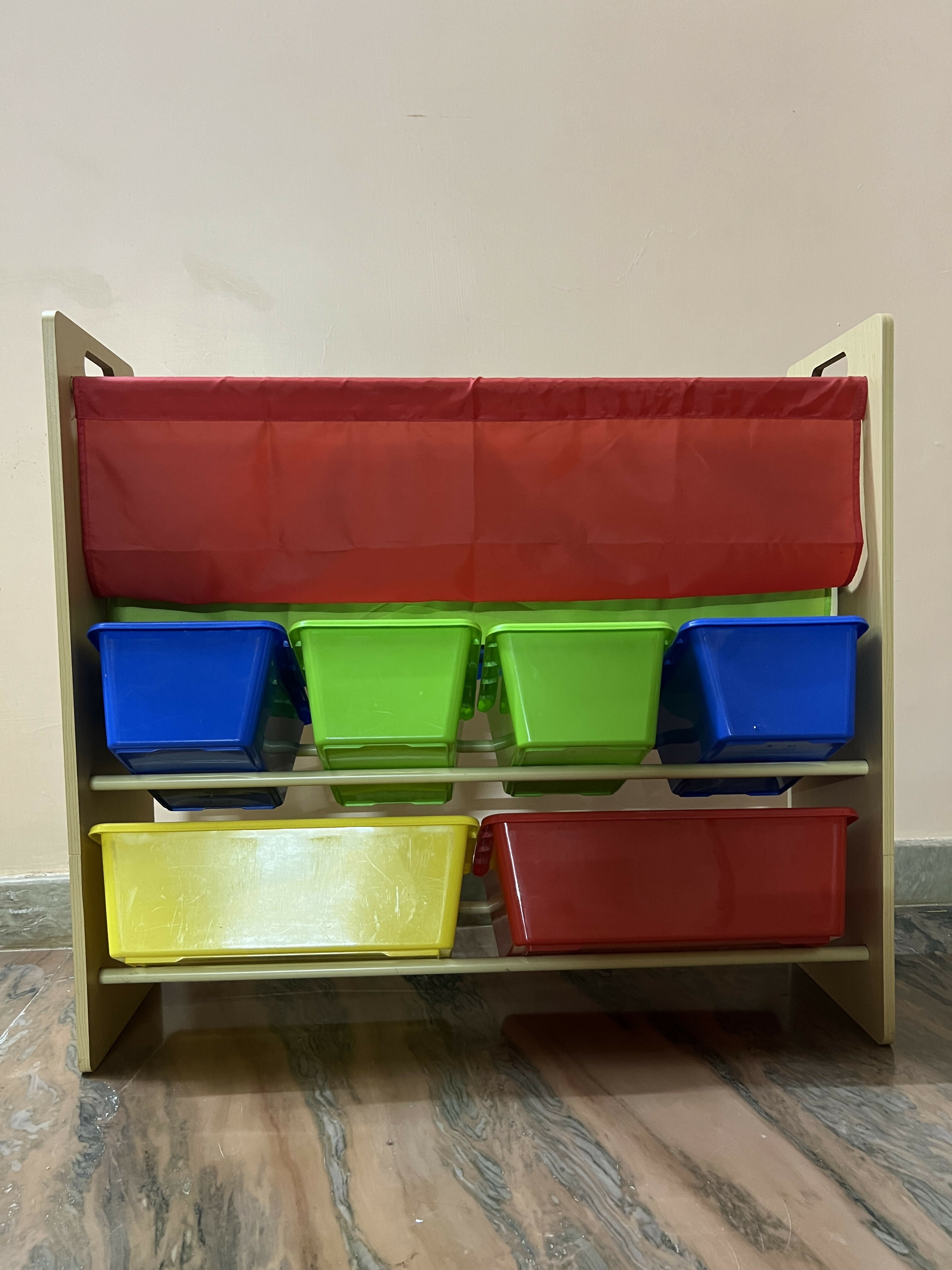 Children's toy storage unit with colorful bins 