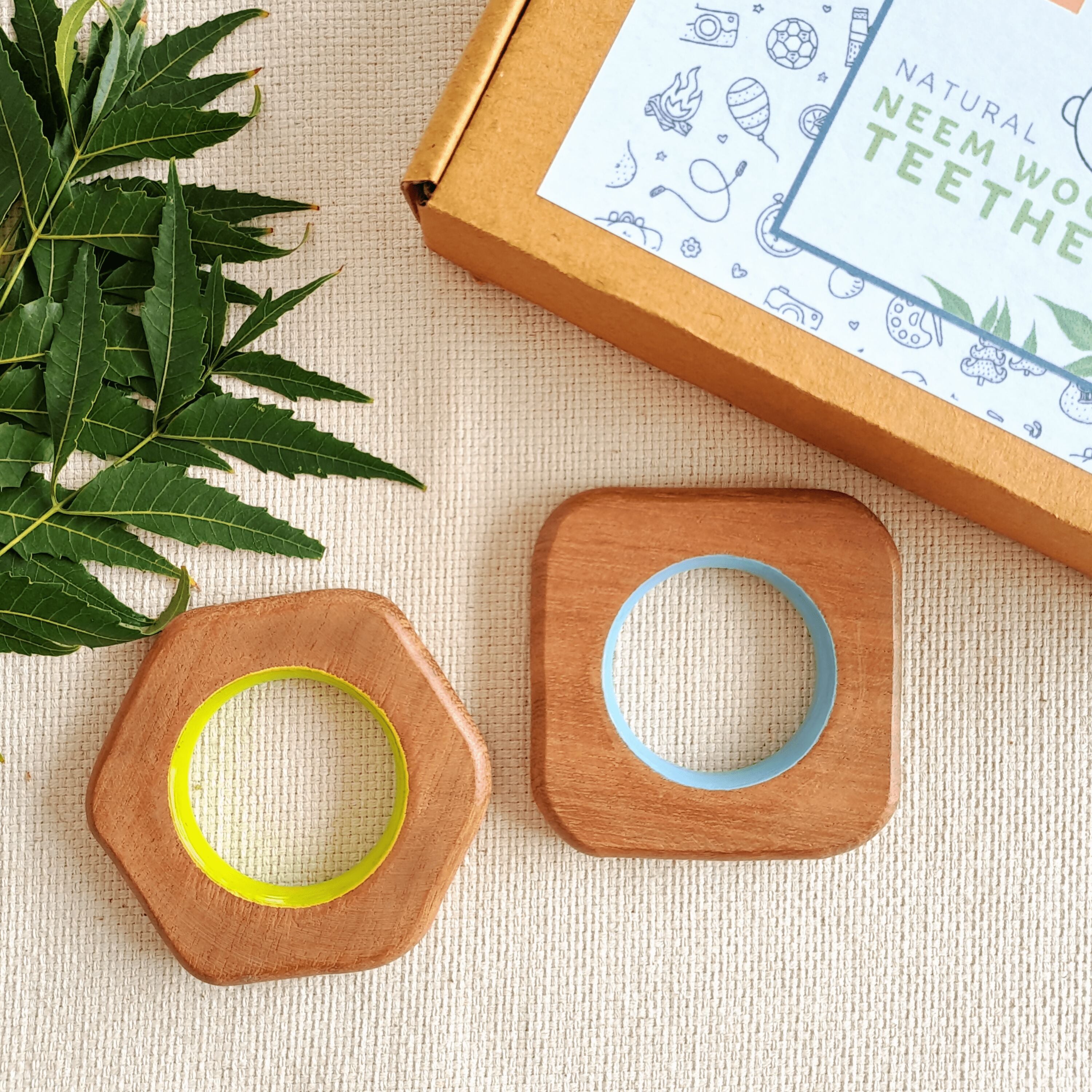 Explore shapes and soothe gums with Babycov's Cute Neem Wood Teethers - natural comfort for safe and playful chewing!