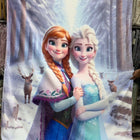 Fleece blanket with characters from 'Frozen' in a snowy forest setting