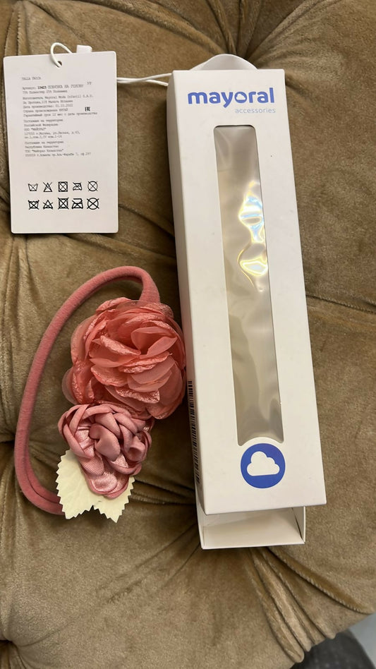 Accessorize your baby girl's outfit with the MAYORAL Baby Hairband, featuring a soft and stretchy design for comfort and style. The delicate bow detail adds charm to any look, making it perfect for special occasions or everyday wear.