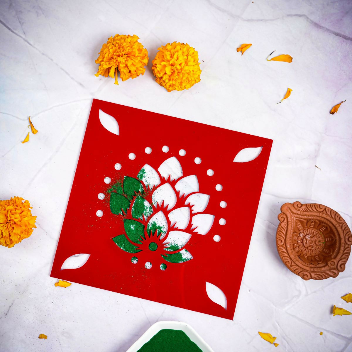 Elevate your festive celebrations with our DIY Rangoli Kit, a delightful set designed to add a touch of artistry and tradition to your home. This kit includes everything you need to create a beautiful rangoli, including a traditional stencil, six vibrant rangoli colors, and a charming diya.