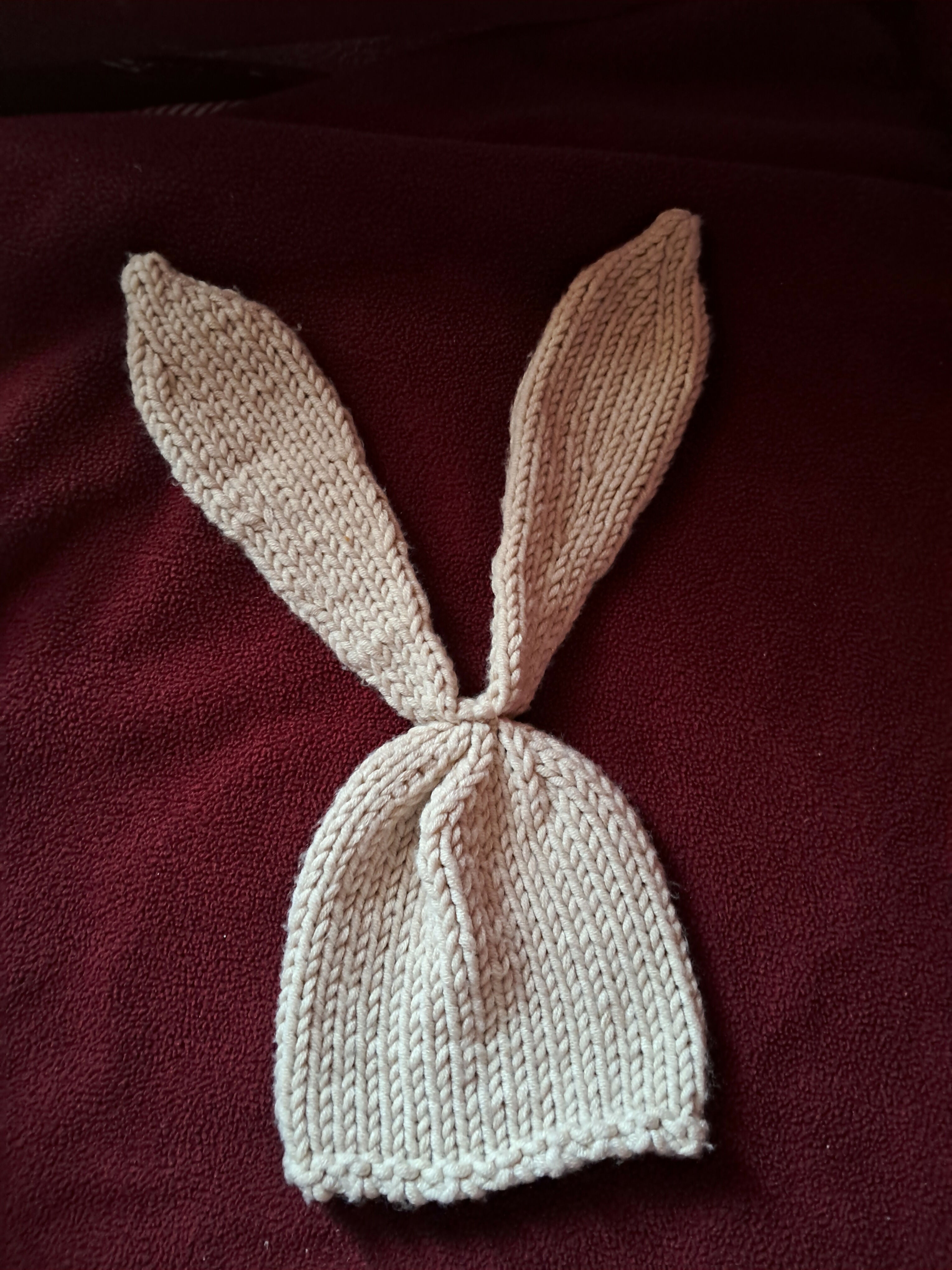 Knitted beige bunny hat with ears 