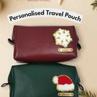 Two personalized travel pouches with festive designs 