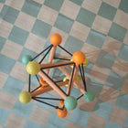 Curious cub geometric rattle ball toy