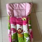 Children's seat with pink top and colorful bottom 