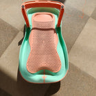 Star and Daisy Baby Bath Seat in Orange-Green, designed for babies 0–1 year with an upgraded supportive design and anti-slip base for comfortable, convenient supervised bathing.