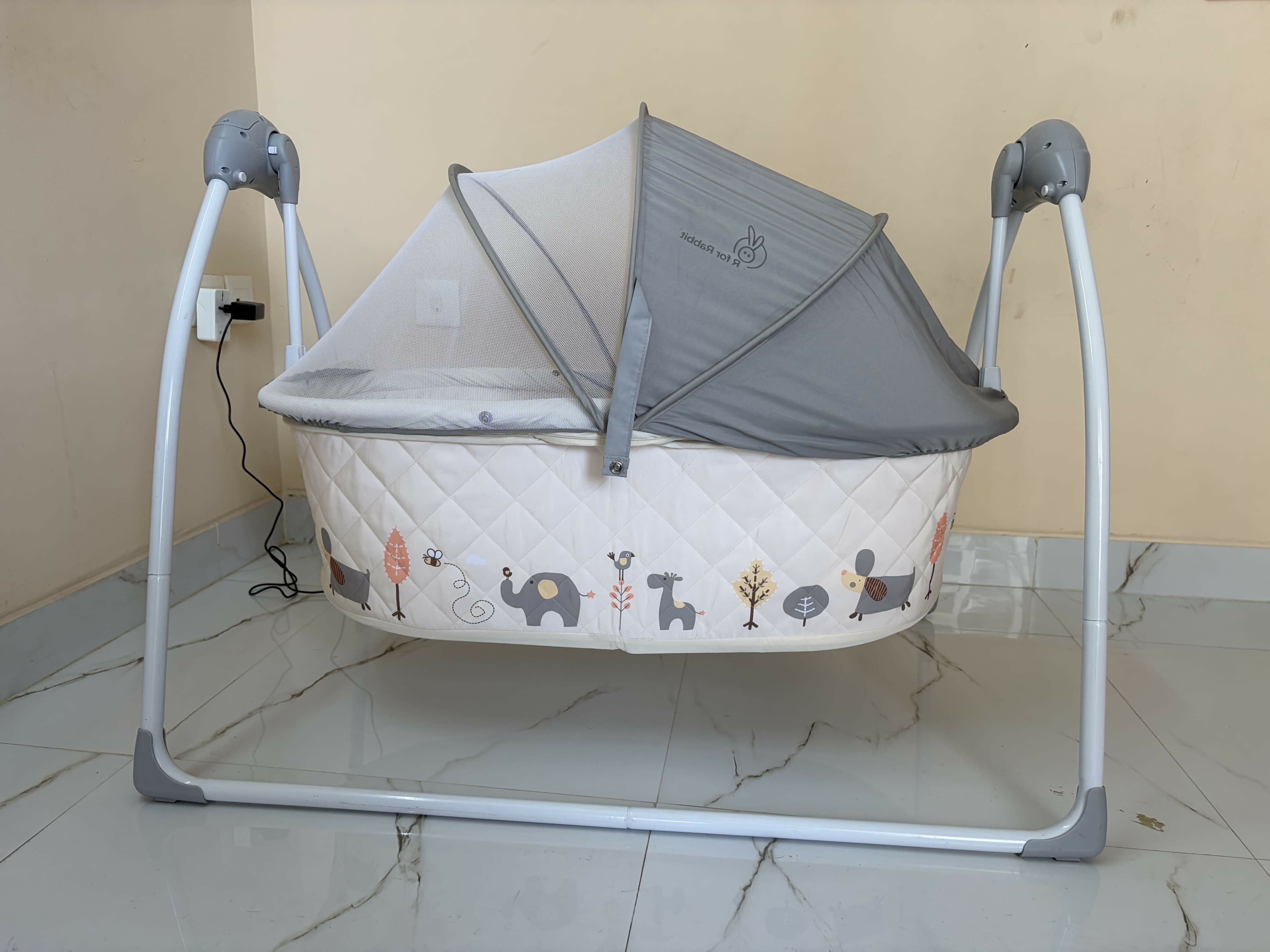R for Rabbit Lullabies baby automatic electric cradle with gentle rocking motion, cozy sleeping space, secure design, soothing comfort, and automatic swing support for baby sleep.