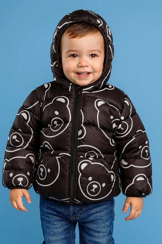 Child wearing a black puffer jacket with bear patterns 
