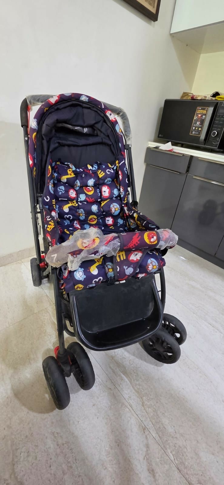 BABYHUG Cosy Cosmo Stroller/Pram with a lightweight foldable frame, reclining seat, adjustable canopy, 5-point safety harness, smooth wheels, and storage basket for comfortable everyday travel with babies and toddlers.