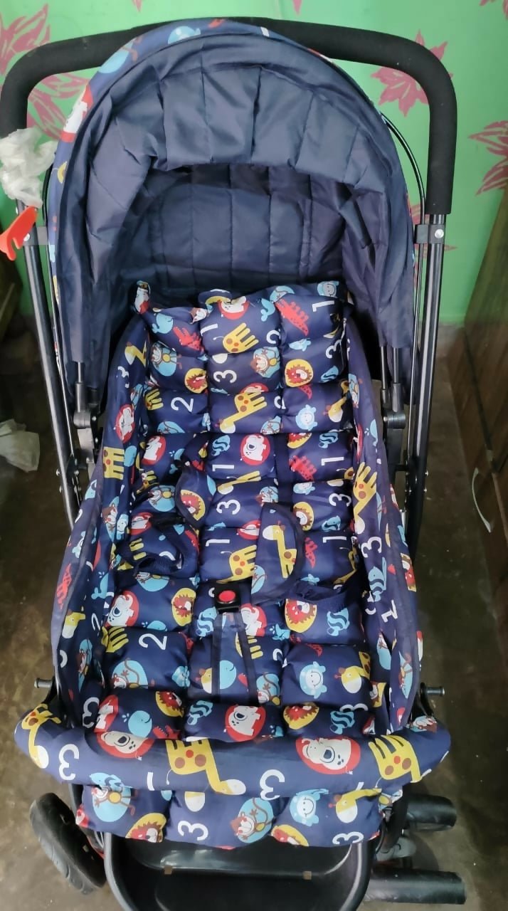 BABYHUG Cosy Cosmo Stroller/Pram in Navy Blue with reversible handle, comfortable reclining seat, adjustable canopy, back pocket, safety harness, smooth wheels, and foldable design for convenient baby travel.