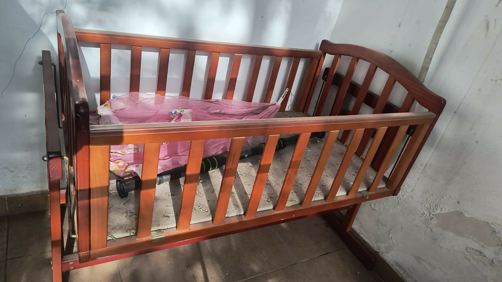 BABYHUG Lonia wooden baby cradle crib with sturdy wooden construction, cozy sleeping space, gentle rocking design, and comfortable support for newborns and babies.