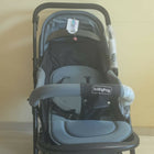 BABYHUG Symphony stroller with reversible handle, reclining seat, safety harness, adjustable canopy, smooth wheels, and comfortable travel support for babies and toddlers.