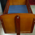 BAYBEE 2-in-1 Wooden Cradle for Newborn Baby with sturdy wooden construction, gentle rocking function, convertible design, breathable sleeping area, and secure frame for safe and comfortable newborn rest.