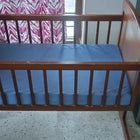 BAYBEE 2-in-1 Wooden Cradle for Newborn Baby with sturdy wooden construction, gentle rocking function, convertible design, breathable sleeping area, and secure frame for safe and comfortable newborn rest.