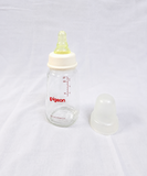 Pigeon 120ml Glass Feeding Bottle with Peristaltic silicone nipple, BPA-free glass, ergonomic shape, and durable design for safe, comfortable, and natural feeding for newborns and infants.