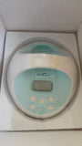 SPECTRA S-1 Plus Electric Breast Pump in White & Sky Blue with adjustable suction levels, massage mode, rechargeable battery, closed-system hygiene, and quiet operation for comfortable milk expression.