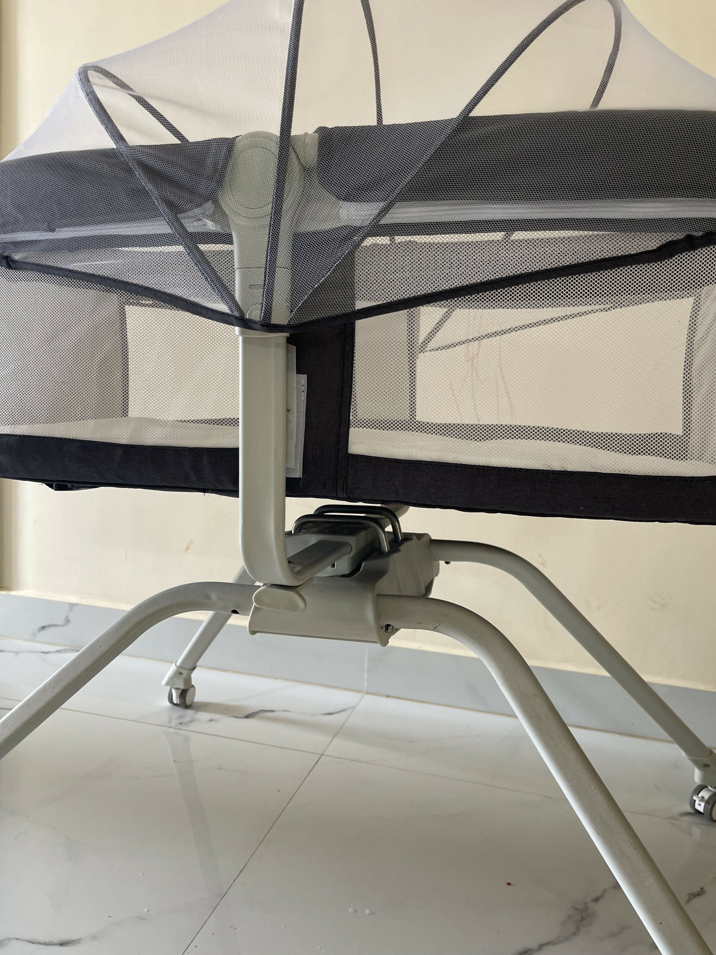 STAR AND DAISY Baby Cot in Almost New condition featuring a sturdy design, protective side rails and comfortable sleeping space, creating a practical setup for supervised rest and sleep at home.