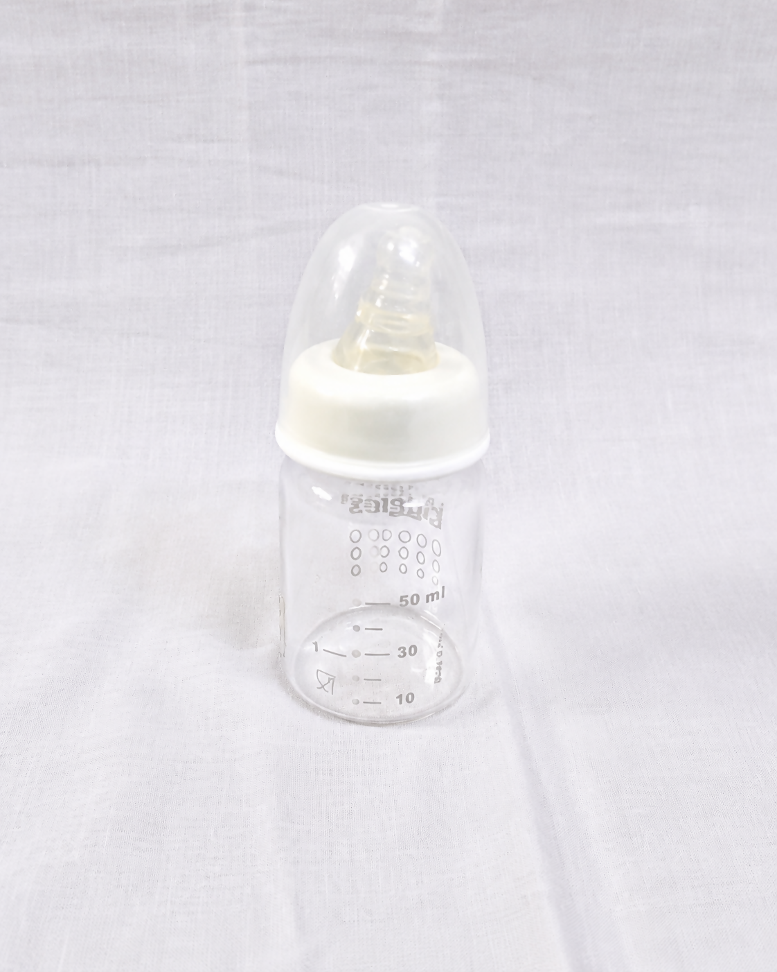 Giggles 50ml Baby Feeding Bottle with BPA-free construction, soft silicone nipple, compact design, and easy-to-hold shape for safe, comfortable feeding of newborns and infants.