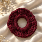 Handmade Crochet Rubber Bands for Baby Girls with cute and soft designs.