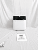 Dr. Brown's Deluxe electric steam bottle sterilizer with BPA-free construction, 6-bottle capacity, and spacious compartments for bottles, nipples, pacifiers, and baby feeding accessories.