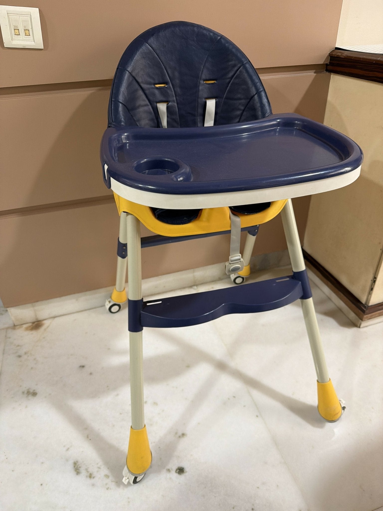 Star & Daisy High Chair with adjustable height, comfortable padded seat, safety harness, removable feeding tray, and foldable design for convenient and secure mealtimes for babies and toddlers.