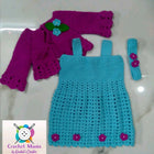 Handmade Crochet Baby Frock with delicate crochet detailing for baby girls.