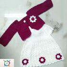 Handmade Crochet Baby Frock with delicate crochet detailing for baby girls.