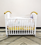 HunyHuny Wooden Baby Cot Crib B102 with rocking function, lockable wheels, included mattress, spacious sleeping area, and a sturdy wooden frame for safe and comfortable sleep.
