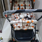 BABYHUG stroller with a lightweight foldable design, reclining seat, adjustable canopy, 5-point safety harness, smooth wheels, and spacious storage basket for comfortable travel with babies and toddlers.