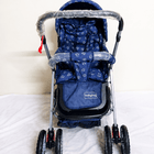 Babyhug Reversible Handle Baby Stroller Pram with mosquito net, reversible handle, reclining seat, foldable frame, 5-point safety harness, adjustable canopy, and storage basket for comfortable travel.