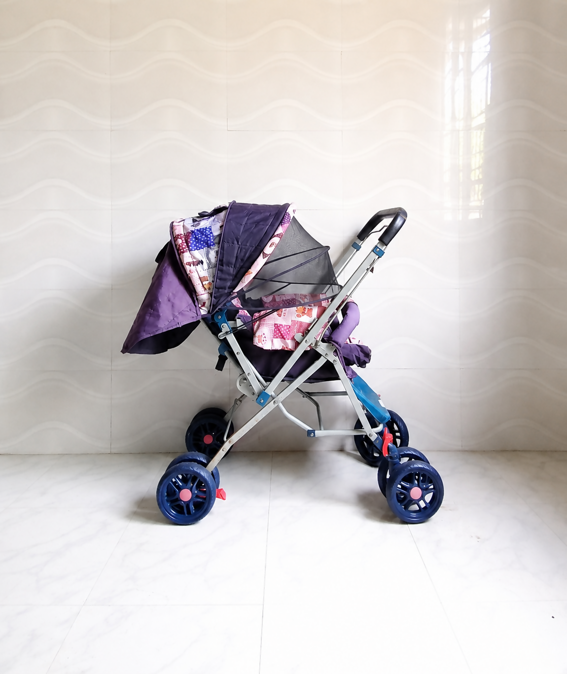 STAR & DAISY reversible baby stroller pram with mosquito net, reclining seat, reversible handle, safety harness, adjustable canopy, and comfortable travel support for babies.