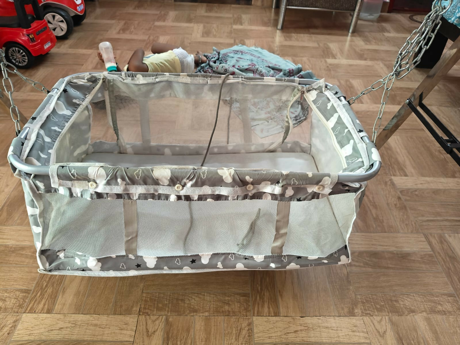 Steel Cradle for Baby featuring a sturdy metal frame, comfortable sleeping space, gentle rocking design, and durable construction for soothing and resting newborns and infants.