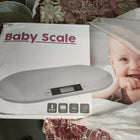 Baby Weighing Scale with a digital display, accurate weight measurement, stable platform, easy-to-read screen, and durable design for tracking your baby's growth and development.