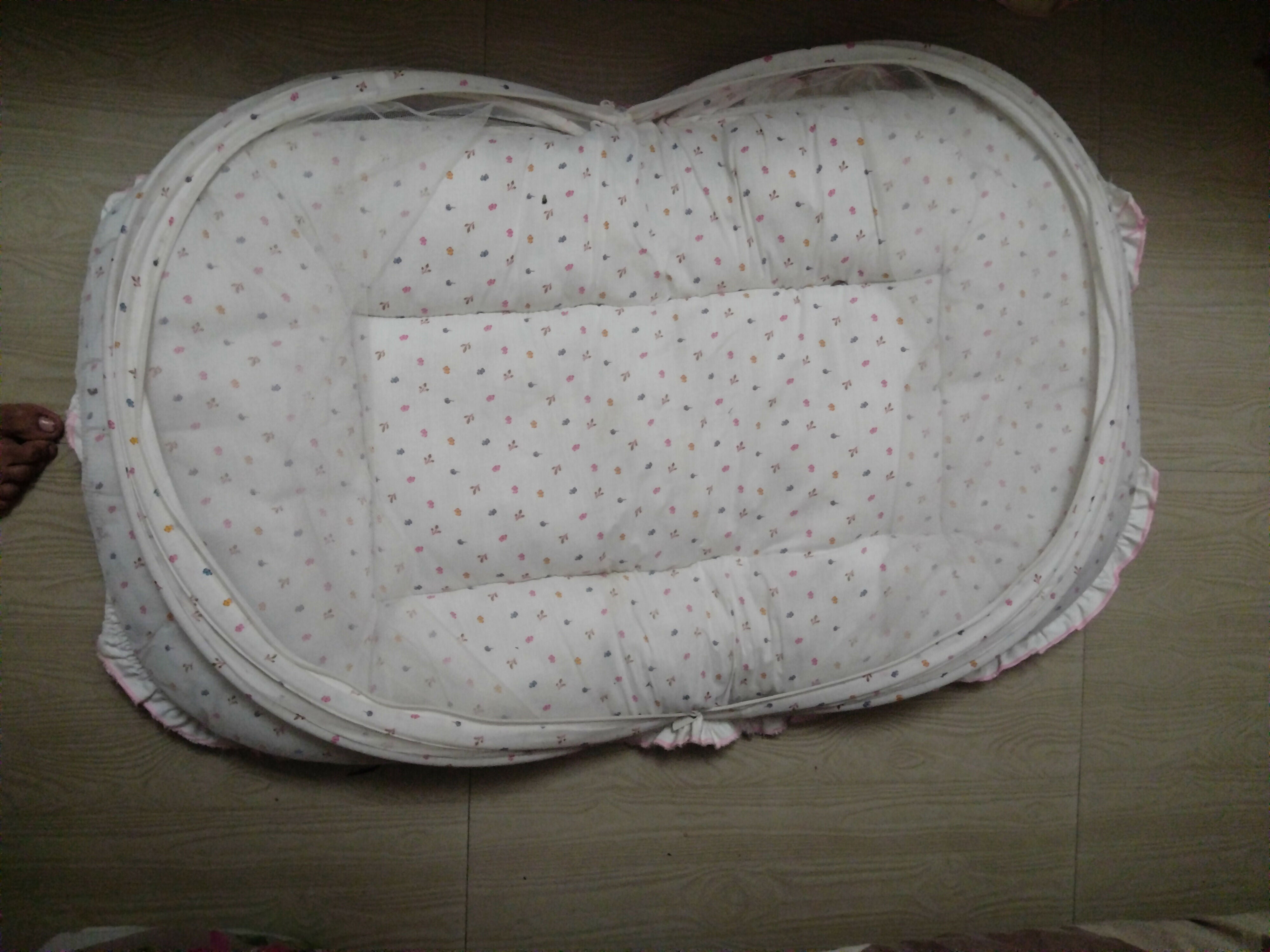 Baby Mattress with Pillow in Almost New condition featuring a soft, cushioned design and matching pillow, creating a comfortable resting setup for babies during supervised rest and relaxation.