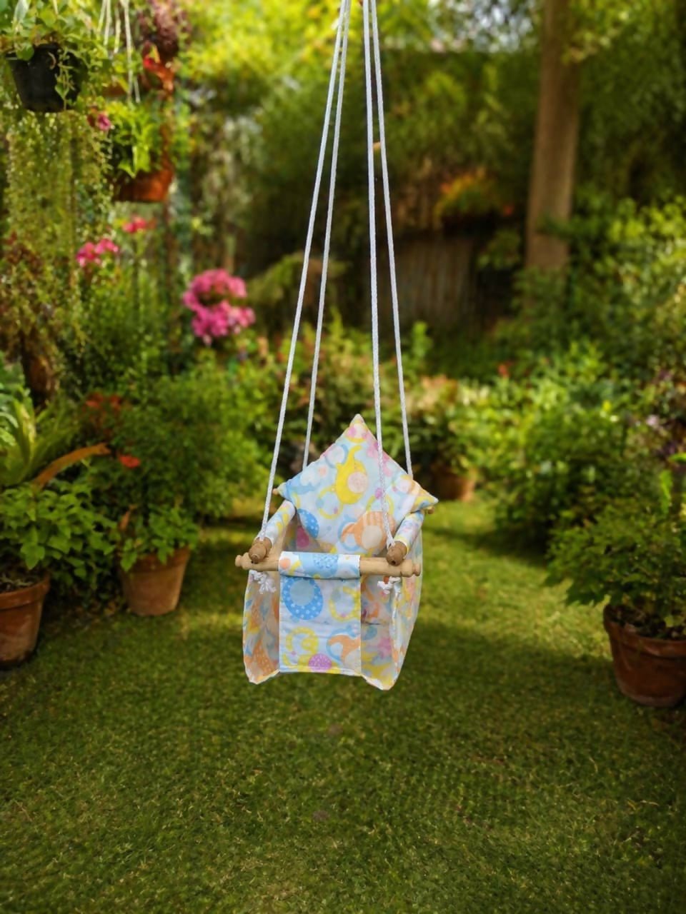 Baby Swing with gentle rocking motion, comfortable padded seat, safety harness, sturdy frame, and soothing design to help keep babies relaxed, entertained, and comfortable during supervised rest.