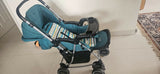 BABYHUG 2-in-1 Rock & Roll Stroller/Pram Cum Rocker with a convertible stroller and rocker design, reclining seat, reversible handle, adjustable canopy, 5-point safety harness, and foldable frame for versatile everyday use.