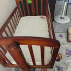 BABYHUG Joy Baby Cradle with Mattress for comfortable rest and gentle rocking.
