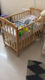 BABYHUG Montana Cot/Crib with Mattress featuring a sturdy design, protective side rails and comfortable mattress, creating a practical and cozy sleeping space for babies at home.