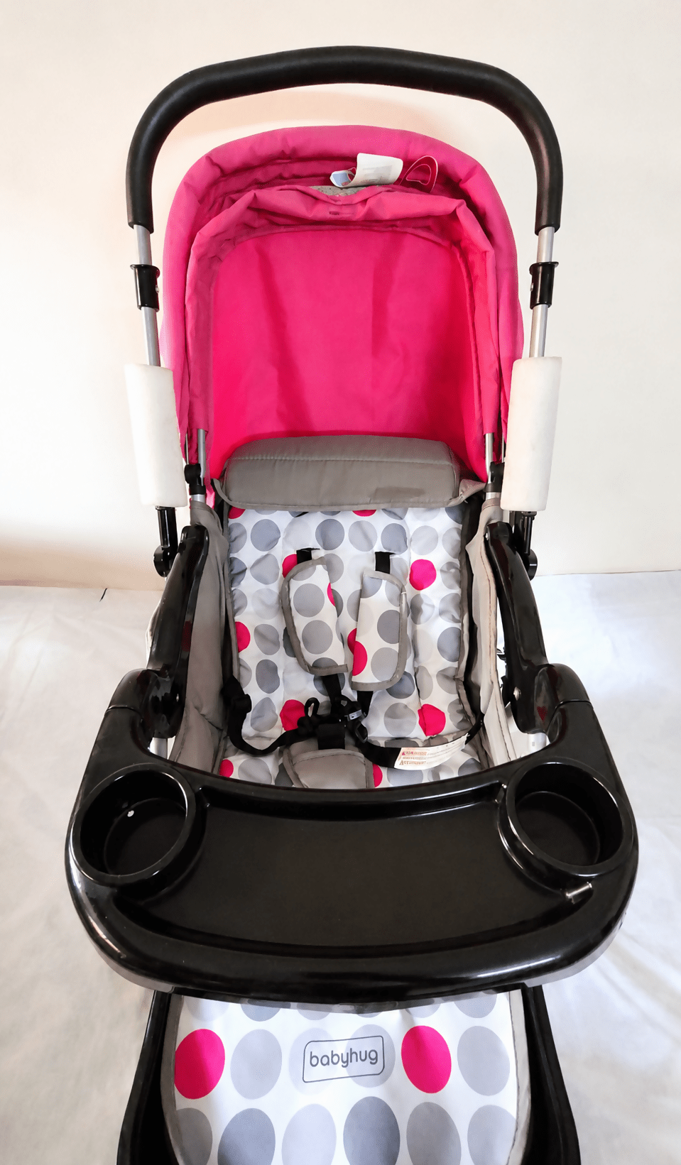Babyhug Reversible Handle Baby Stroller Pram B118 with reclining seat, reversible handle, 5-point safety harness, protective canopy, smooth wheels, and foldable design for comfortable everyday outings with babies and toddlers.