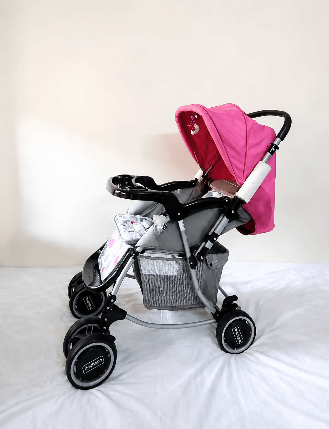 Babyhug Reversible Handle Baby Stroller Pram B118 with reclining seat, reversible handle, 5-point safety harness, protective canopy, smooth wheels, and foldable design for comfortable everyday outings with babies and toddlers.