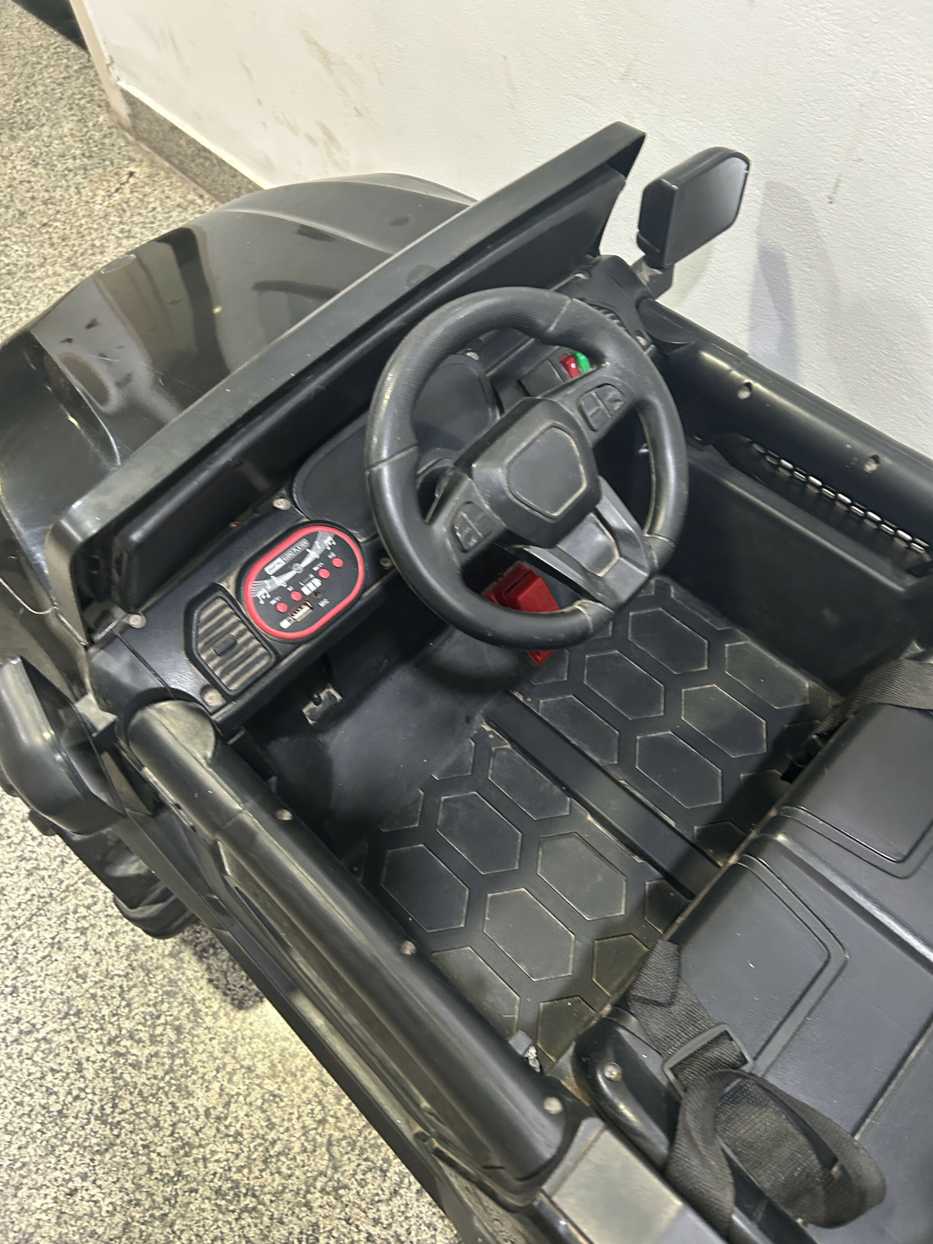 Battery Powered Ride-On Jeep for Toddlers in Some Used condition featuring a fun jeep-style design, comfortable seat, steering wheel, and rechargeable battery-powered operation for supervised indoor and outdoor play.