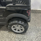 Battery Powered Ride-On Jeep for Toddlers in Some Used condition featuring a fun jeep-style design, comfortable seat, steering wheel, and rechargeable battery-powered operation for supervised indoor and outdoor play.